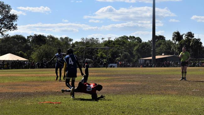 Thunder’s Adam Tipungwuti takes the mark of the day in the Tiwi Island Football League grand final between Tuyu Buffaloes and Pumarali Thunder. Picture: Max Hatzoglou