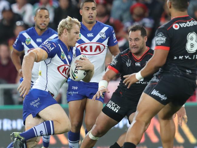 Aiden Tolman takes on the Warriors defence.