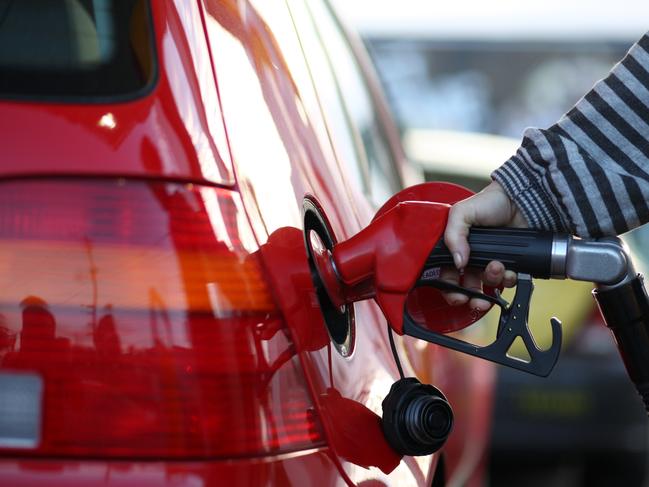 Women filling up at petrol station