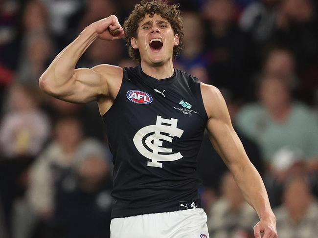 MELBOURNE, AUSTRALIA - JULY 13: Charlie Curnow of the Blues celebrates after scoring a goal during the round 18 AFL match between Western Bulldogs and Carlton Blues at Marvel Stadium, on July 13, 2024, in Melbourne, Australia. (Photo by Robert Cianflone/Getty Images)