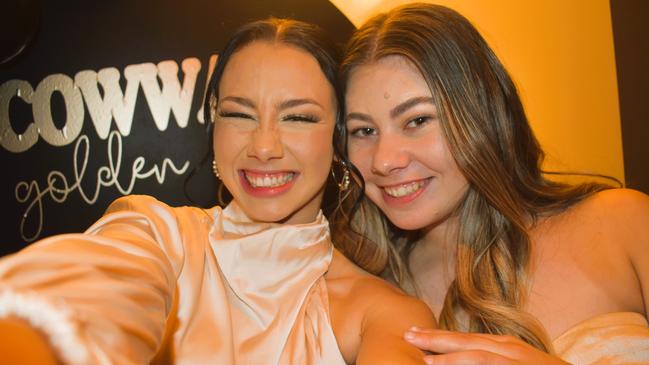 Naomi Gilmore and Nikki Dalrymple having a great night at the Cowwarr Saints Football &amp; Netball Club Golden Gala Ball 2024. Picture: Jack Colantuono