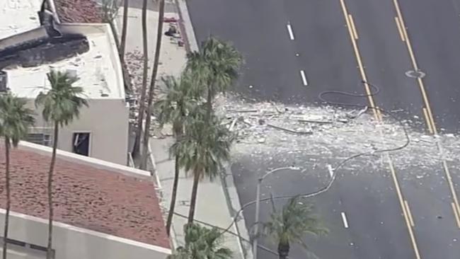 Debris covers the ground after an explosion on Saturday, May 17, 2025 in Palm Springs, Calif. (ABC7 Los Angeles via AP)