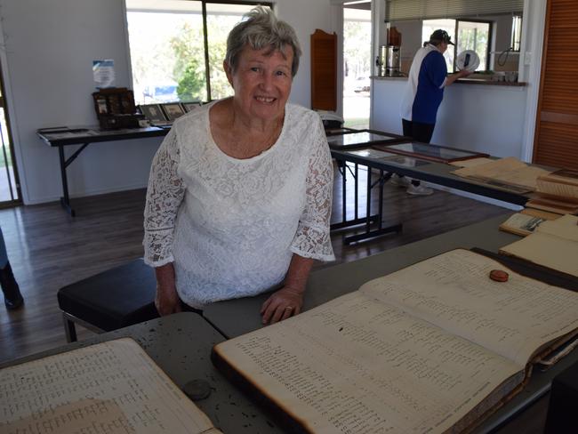 Myra Stanton found the call out note of her father's birth in one of the historical books on display.