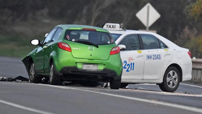 Police at the scene of a head on crash on Victor Harbor Road near Main Road. Picture: Tom Huntley