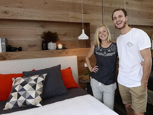 Kara and Kyal inside one of the bedrooms in their apartment. 