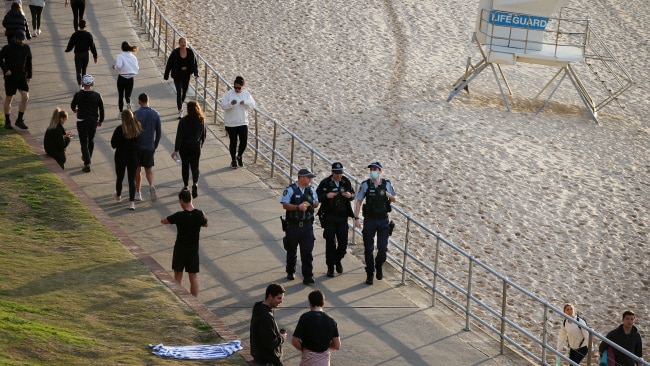 NSW police officers patrol Bondi Beach in Sydney on Wednesday. Photo: Lisa Maree Williams/Getty Images