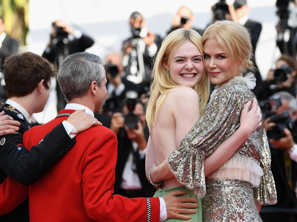 Elle Fanning and Nicole Kidman depart after the “How To Talk To Girls At Parties” screening during the 70th annual Cannes Film Festival at Palais des Festivals on May 21, 2017 in Cannes, France. Picture: Getty