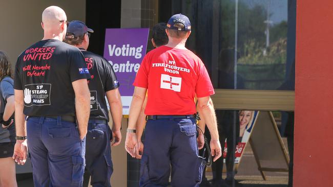 NT Firies turning out for early voting in the Darwin CBD as Polls open.Picture: Glenn Campbell