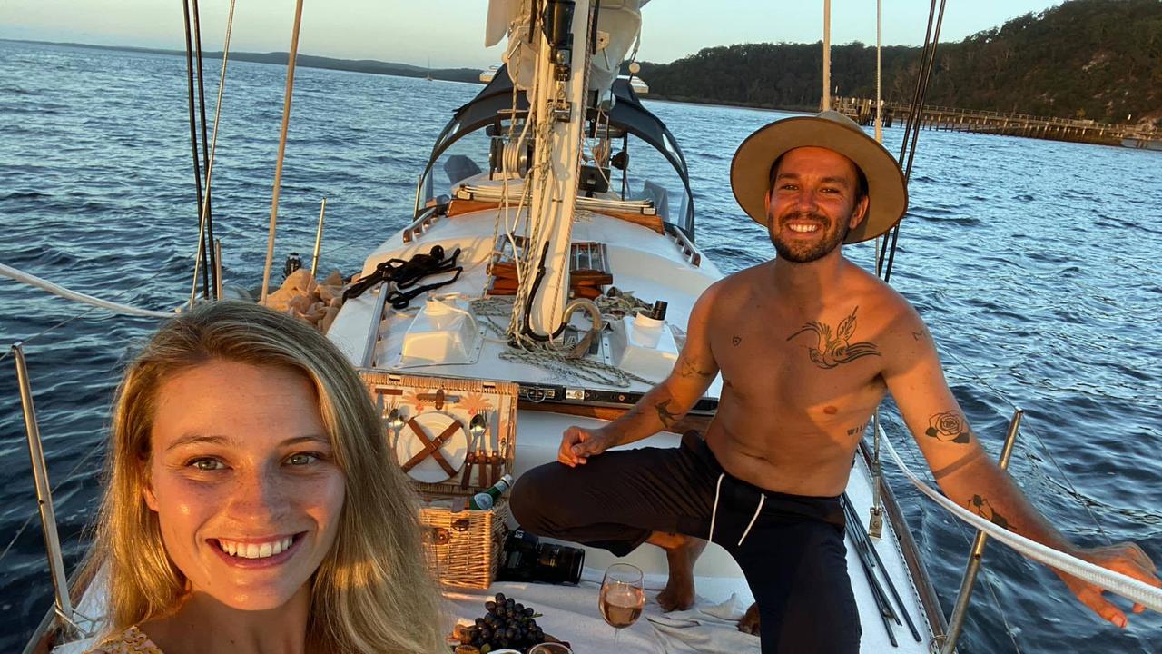 Joel Pringle and his partner Eve on board their yacht in the Whitsundays.