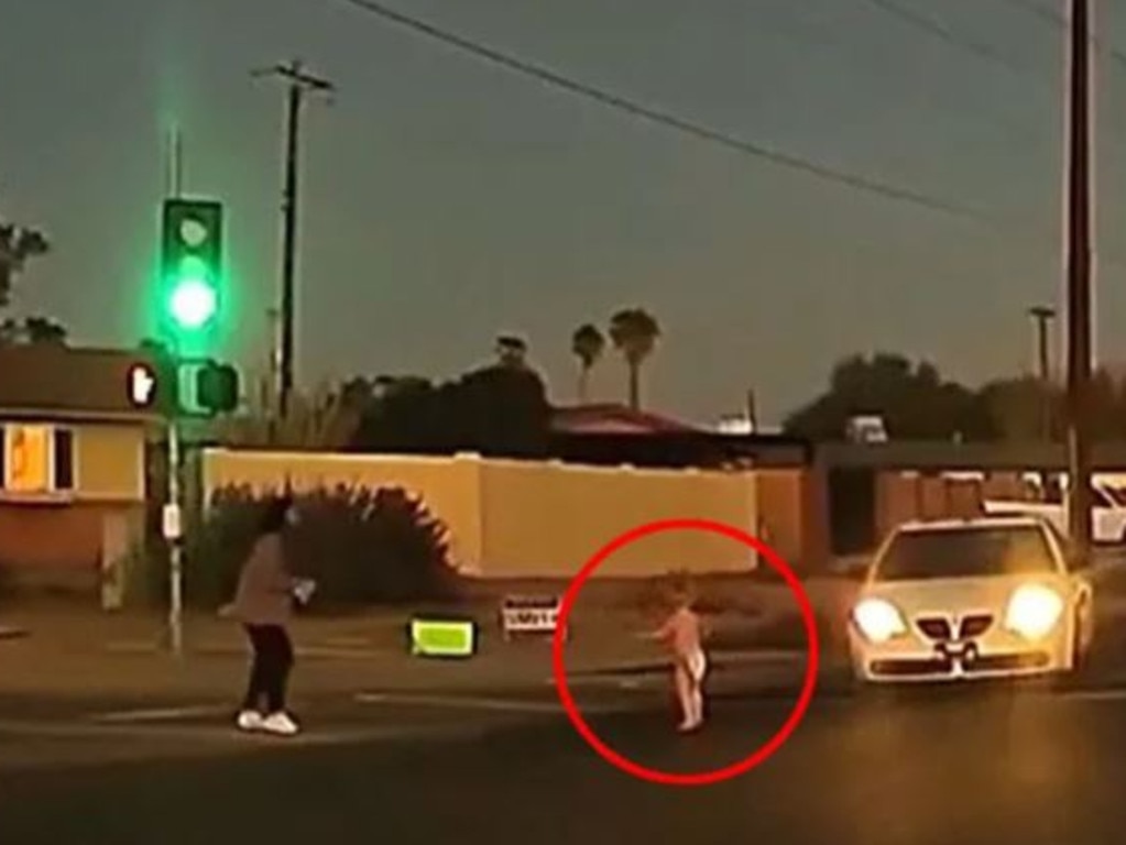 A female pedestrian ran onto the road to save the little boy. Picture: Arizona Family