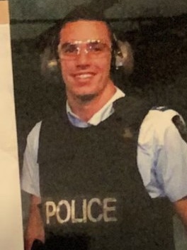 Matthew Thomson in police uniform. Picture: YouTube
