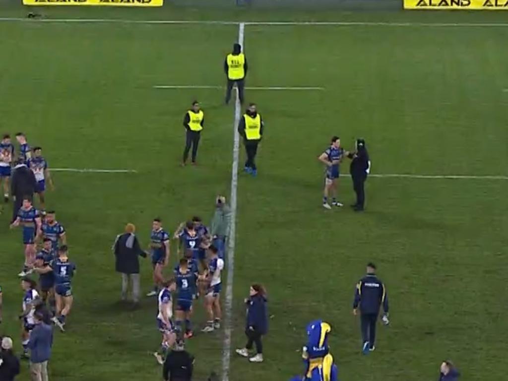 Three security guards shadow Mitchell Moses after Parramatta's win over the Warriors. Credit: Fox Sports