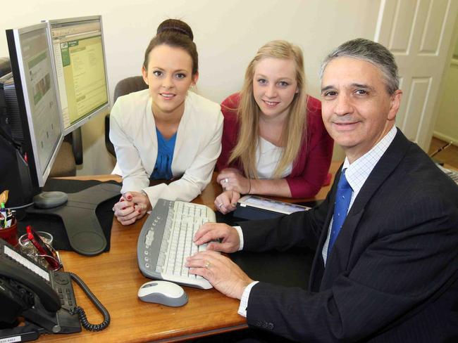 Better than grads ... accounting cadets Justine Radnedge and Jemma Chandler being tutored by Paul Fiumara partner in accounting firm DFK Hirn Newey.