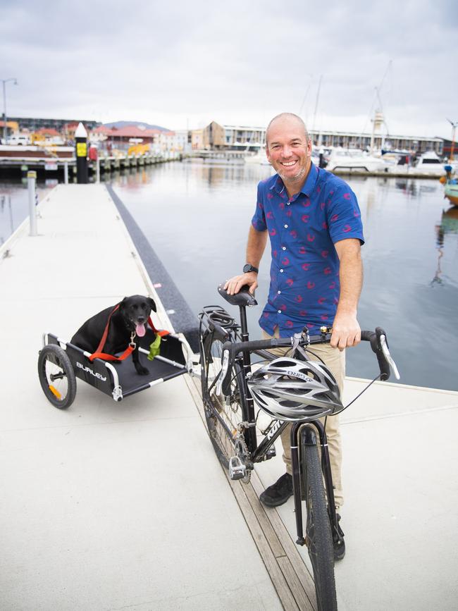 Companion: Photographer and founder of Slow Tasmania, Chris Crerar, and his dog Charlie. Picture: Richard Jupe