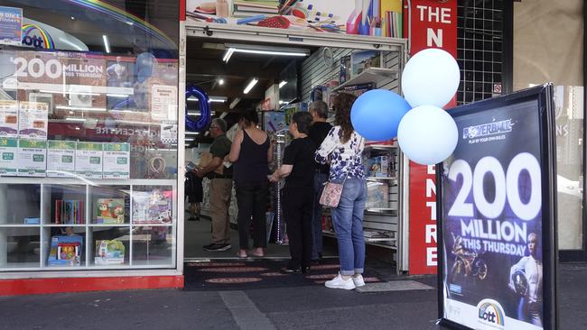 People queue for the $200m jackpot draw.