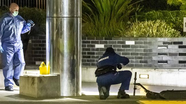 Police at the scene where a teen was found lying in the street following an alleged stabbing in Dryburgh St in North Melbourne on May 31. Picture: David Geraghty