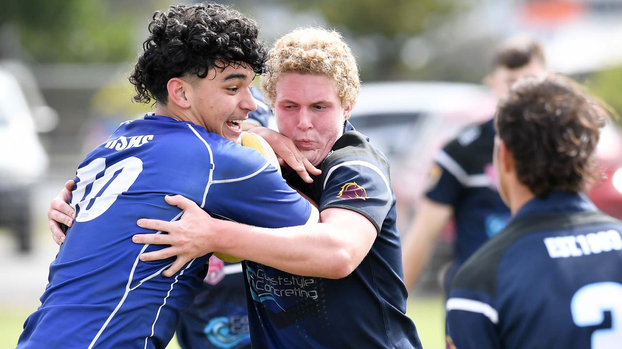 RUGBY LEAGUE: Justin Hodges and Chris Flannery 9s Gala Day. Grand final, Caloundra State High School V Redcliffe State High, year 12. Caloundra's Bradley Higgins in defence. Picture: Patrick Woods.