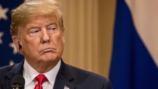 Donald Trump has been widely criticised for refusing to blame the Russian leader for meddling in the 2016 elections. Picture: Chris McGrath/Getty Images