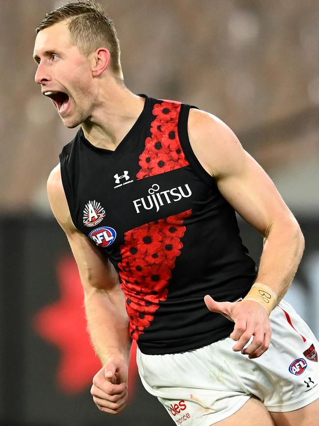 Bomber Shaun McKernan celebrates kicking a goal.