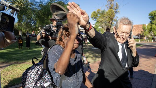 Zach Rolfe’s barrister Michael Abbott KC runs interference outside the Alice Springs Local Court in February. Picture: Liam Mendes