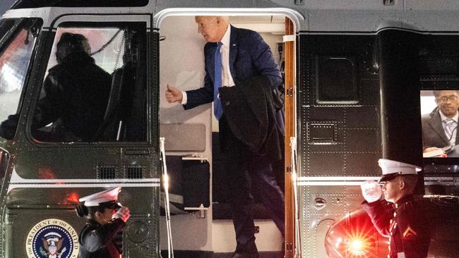 US President Joe Biden gives a thumbs up to the pilot as he lands aboard Marine One at JFK International Airport in New York during the week. Picture: Jim Watson/AFP