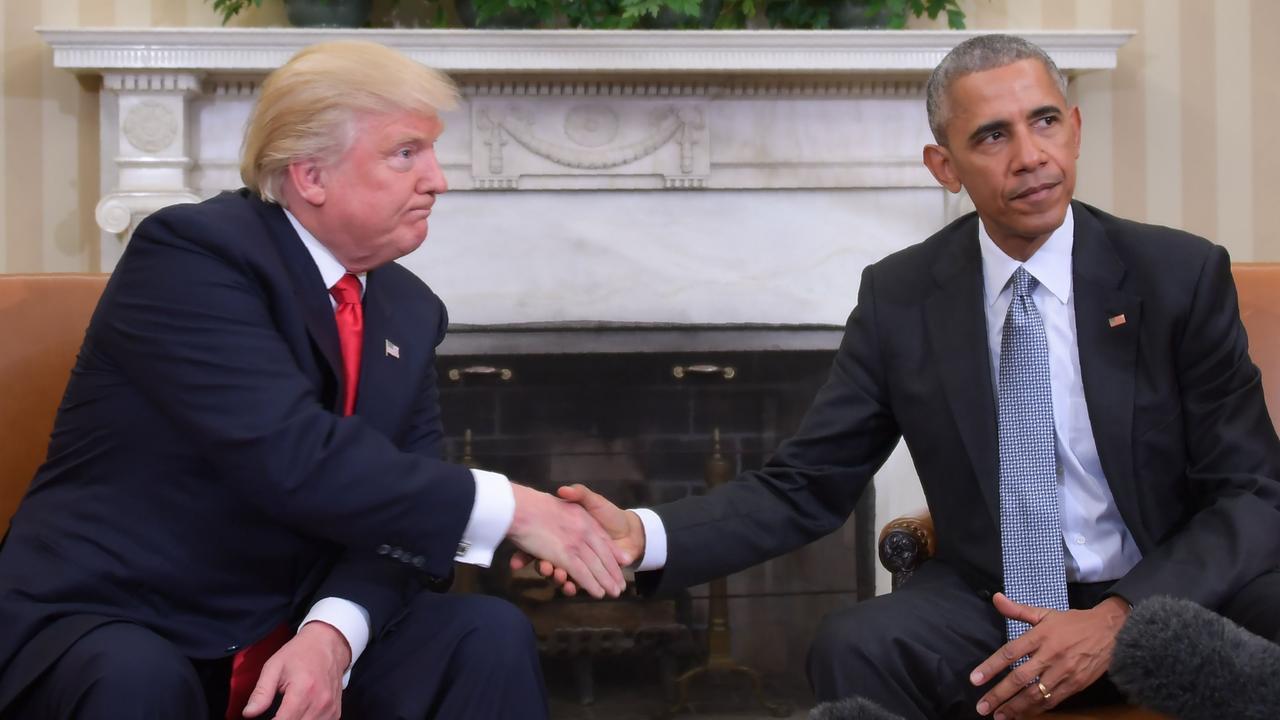 Donald Trump and Barack Obama shake hands during a transition planning meeting at the White House. Picture: Jim Watson/AFP