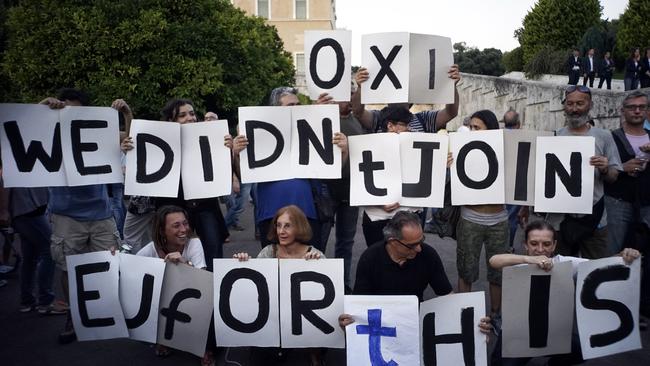 Speaknig out ... demonstrators during a rally in Athens, Greece. Picture: Getty