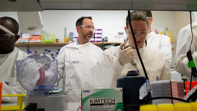 University of Queensland Professor Trent Munro and staff working on a vaccine for coronavirus.