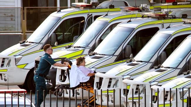 Ramped ambulances and police vehicles at Princess Alexandra Hospital in Woolloongabba on Thursday. Picture: David Clark