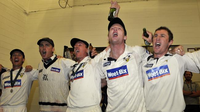 Nick Jewell (second from left) celebrates a Victorian Shield title win, with Bryce McGain, Damien Wright, Cameron White and David Hussey.