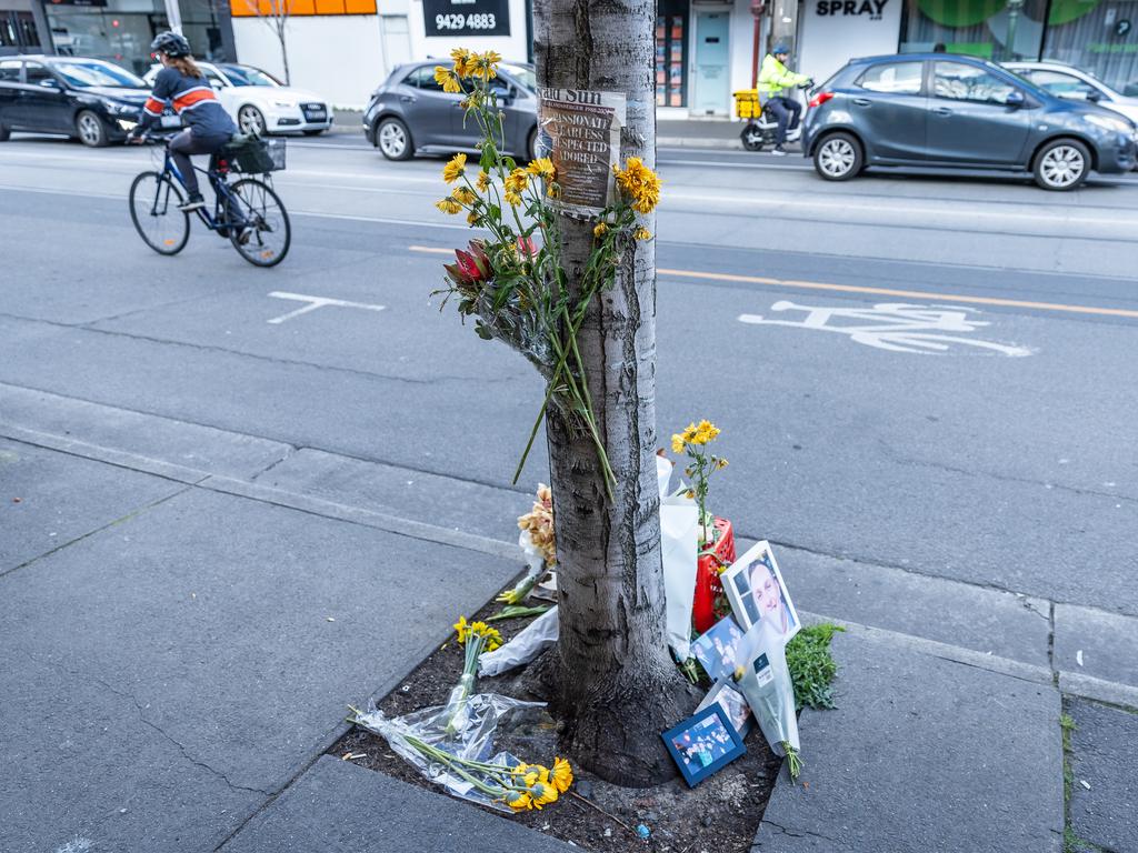 Tributes at the site where Sam Landsberger was killed. Picture: Jake Nowakowski