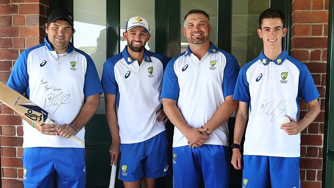 Nathan Lyon with (from left) Gavan Hicks (team for players with a disability captain), Kym Daley (deaf team captain) and Matthew Cameron (blind cricket team member). Picture: Brett Costello