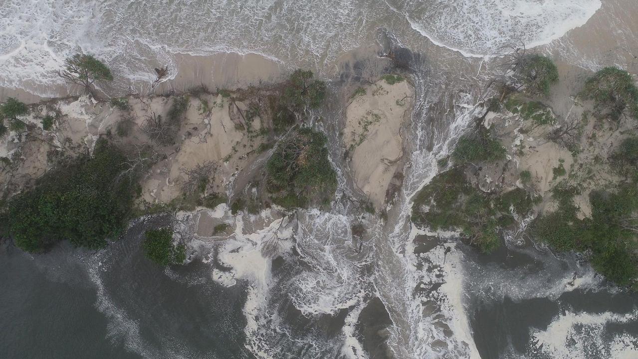 Caloundra resident Zane Jones has snapped the big swell and high tides that caused Bribie Island to break through.