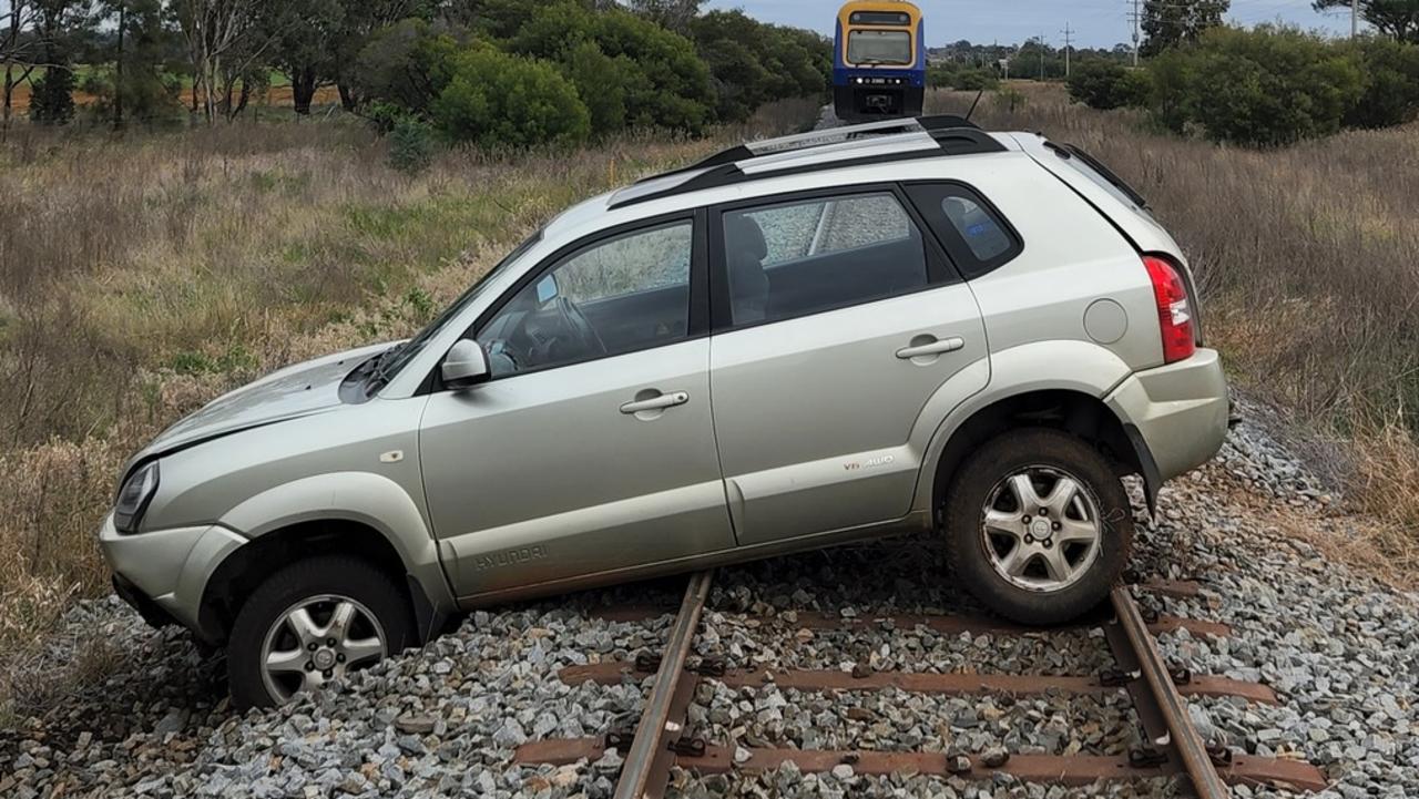 The man allegedly took his boss’s car for a spin and left it on train tracks. Photo: NSW Police