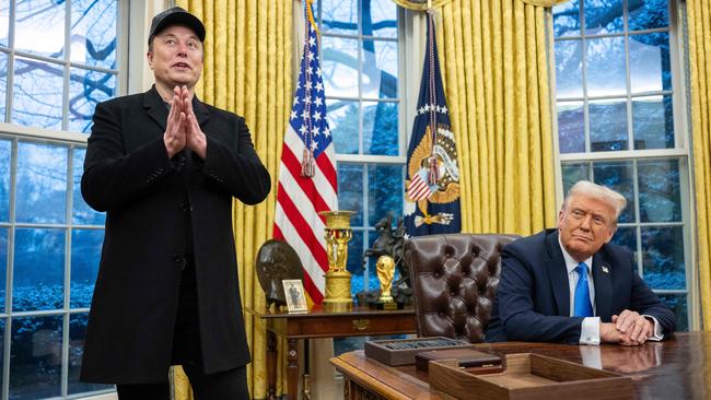 Elon Musk speaks as US President Donald Trump looks on in the Oval Office. Picture: AFP