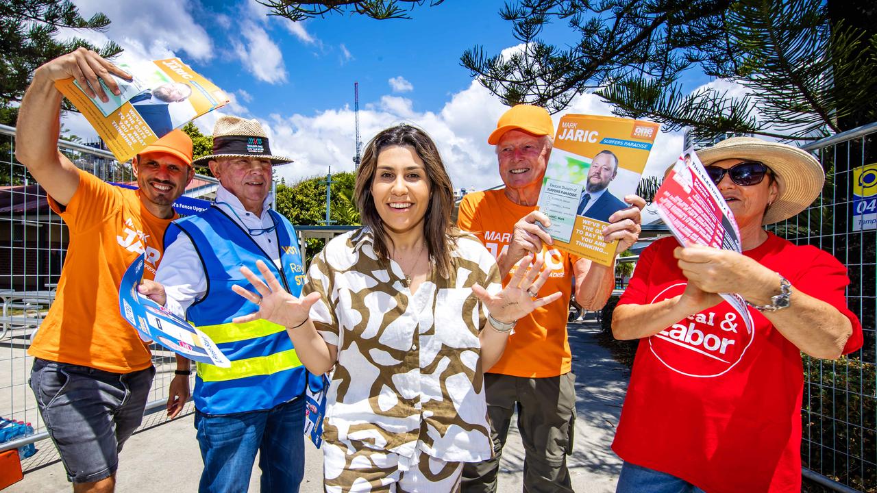 Cass Moon swamped with how to vote cards at Broadbeach State School in the Surfers Paradise electorate. Picture: Picture: Nigel Hallett