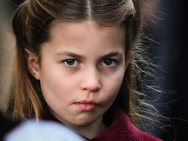 Princess Charlotte of Wales reacts as she leaves at the end of the Royal Family's traditional Christmas Day service. Picture: AFP