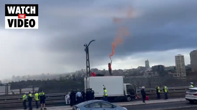 Climate protesters bring Sydney Harbour Bridge traffic to a standstill