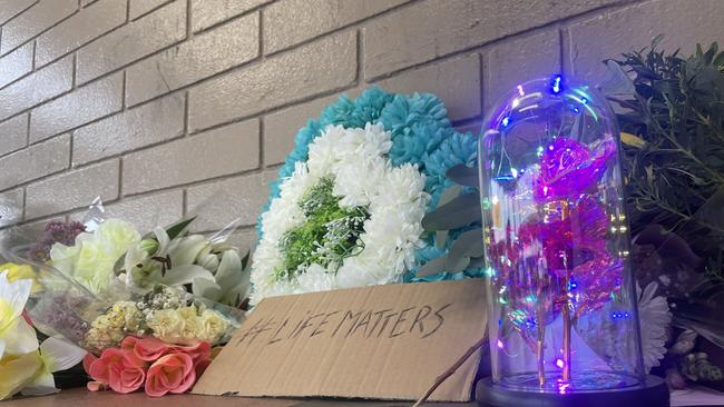 A memorial for a young man who died in Coles while in police custody in Alice Springs. Picture: Gera Kazakov