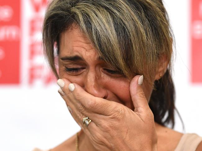 Westpac Bank client Michelle Tate becomes emotional during a press conference at the offices of Maurice and Blackburn Lawyers in Brisbane, Thursday, February 21, 2019. Mrs Tate and her husband Ian are the lead litigants in the first class action against a big four bank since the publication of the Hayne Royal Commission Report that has been filed today in the Federal Court. (AAP Image/Dan Peled) NO ARCHIVING