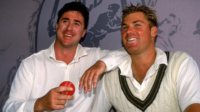 Australian spinners Tim May (left) and Shane Warne celebrate Australia’s Second Test victory over New Zealand in Hobart in 1993. Picture: Getty Images