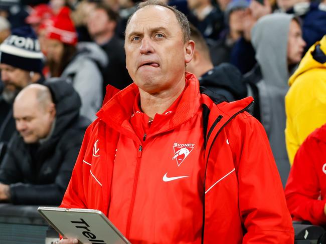 MELBOURNE, AUSTRALIA - SEPTEMBER 08: John Longmire, Senior Coach of the Swans looks dejected after a loss during the 2023 AFL First Elimination Final match between the Carlton Blues and the Sydney Swans at Melbourne Cricket Ground on September 08, 2023 in Melbourne, Australia. (Photo by Dylan Burns/AFL Photos via Getty Images)