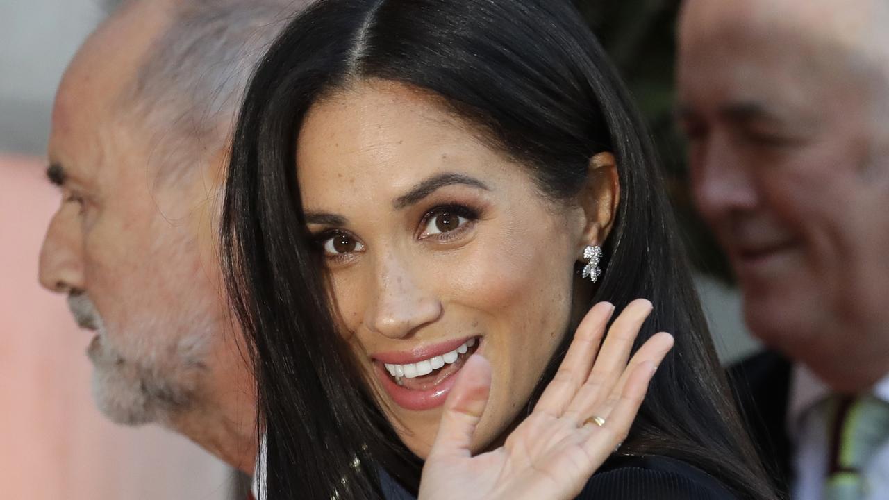 Meghan Duchess of Sussex stuns at first solo royal event in London ...