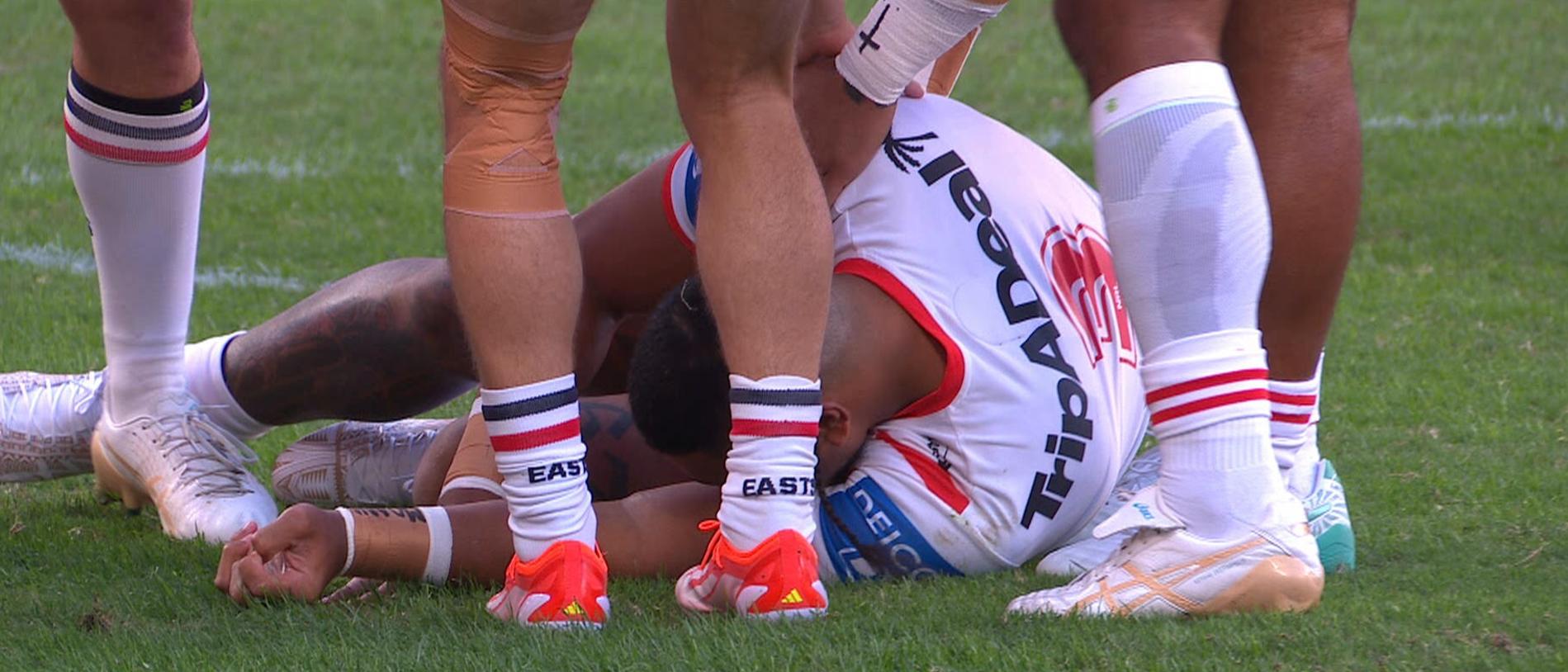 In a dramatic start to the Anzac Day clash, Dragons centre Mosese Suli has been taken off for an HIA following a heavy collision in the first tackle of the game.
