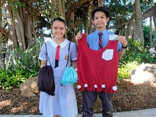 BUDDING BUSINESS OWNERS: Rockhampton Grammar School year eight students Mathew He and Samanta Rimmington have created their own business, making bags out of old t-shirts. Picture: Rachael McDonald  - RGS