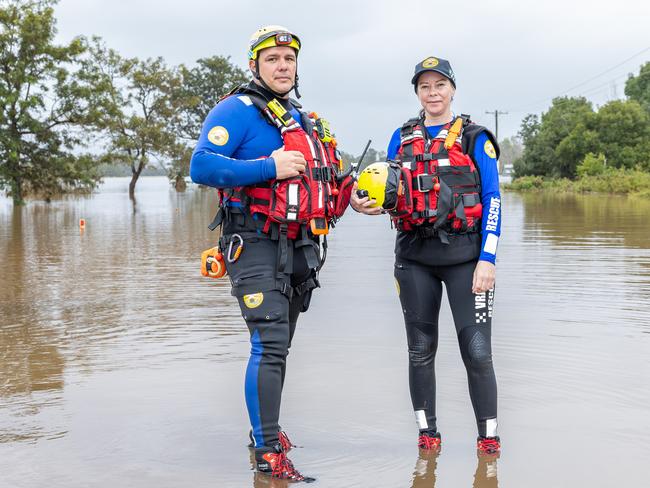 Floods Volunteers Rachel Jones and Carlos Quinteros from VRA rescue have been working all night rescuing residents from their flooded homes in Taree .Picture Thomas Lisson