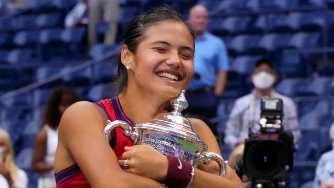 Britain's Emma Raducanu celebrates with the trophy after winning the 2021 US Open Tennis tournament. Picture: AFP