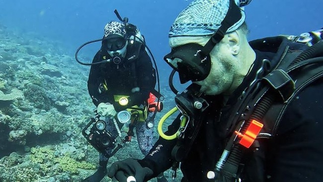 Dr Chris Dudgeon and Fish taxonomist and Vice President of Conservation International’s Asia-Pacific Marine Programs Dr Mark Erdmann from the University of the Sunshine Coast diving. Photo: UniSC