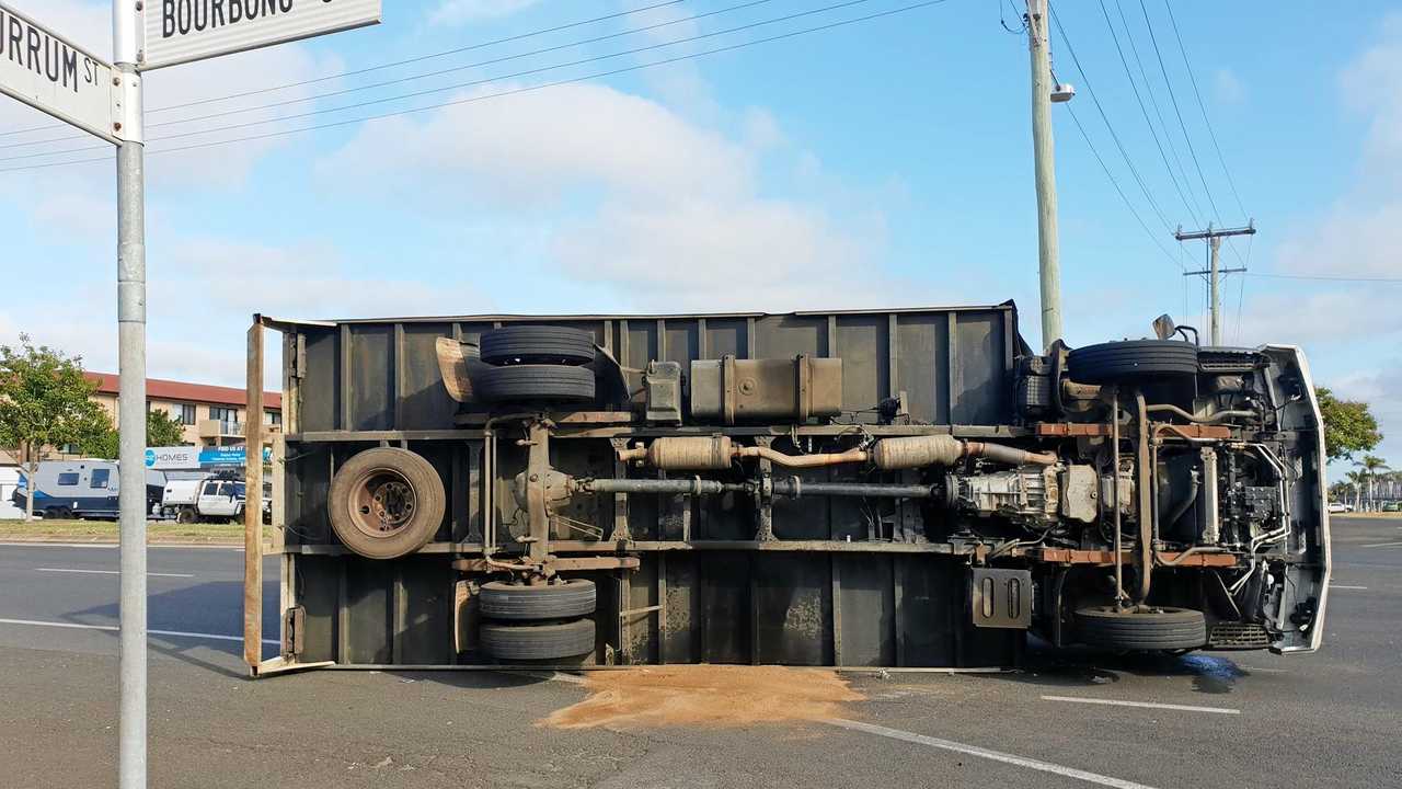 OVERTURNED: A truck has landed on it's side on Bourbong St after a two-car crash. Picture: Toni Benson-Rogan