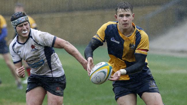 NSW's Joe Hutton gives chase to ACT's Joe Henry.